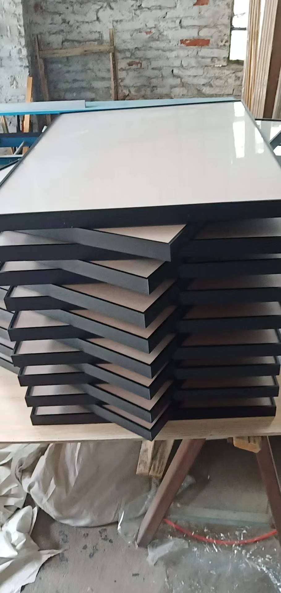 Black assembled aluminium frame samples at DAMAX